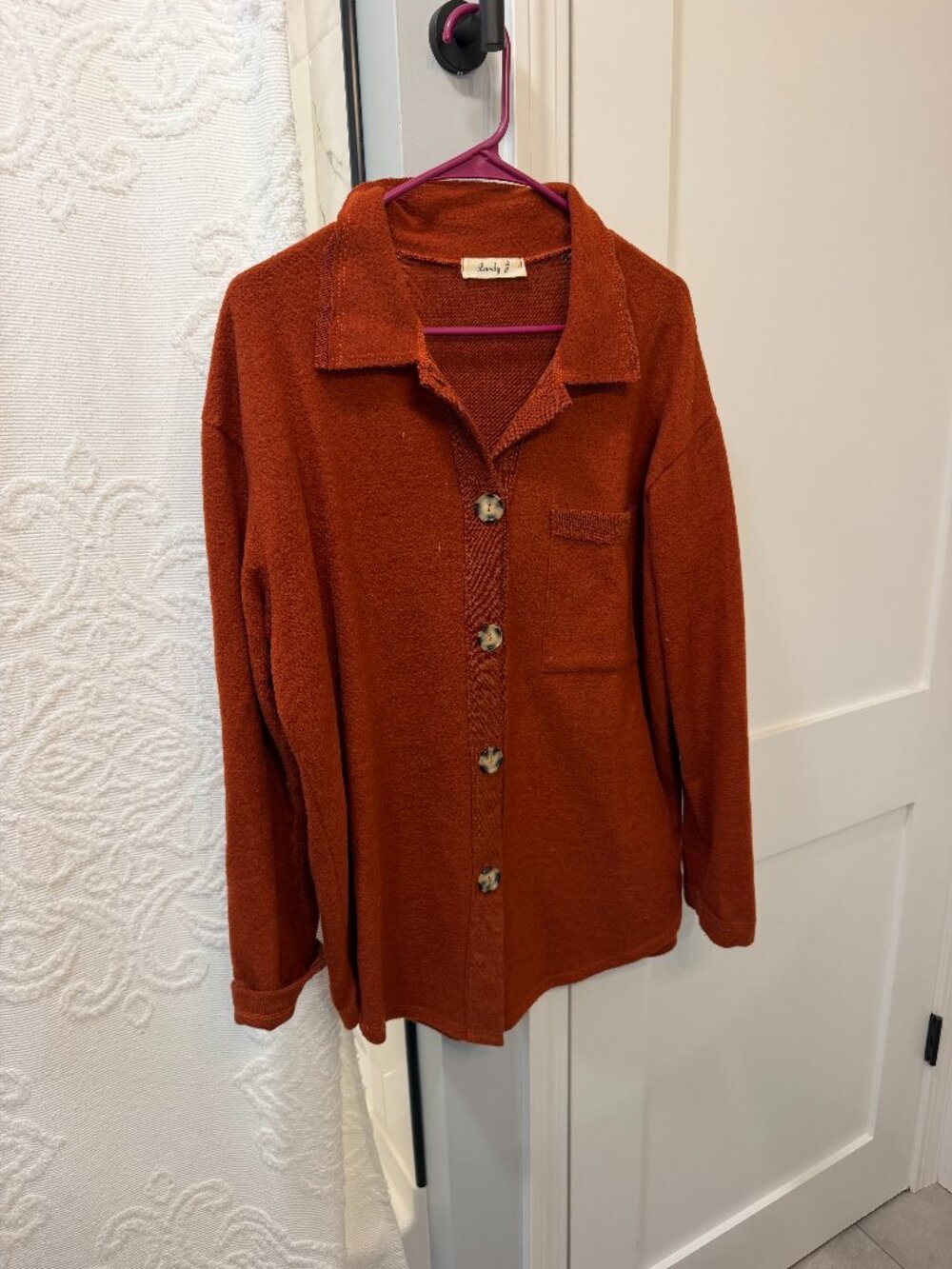 Women's rust orange fleece button up